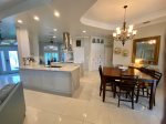 Kitchen and dining area all have views to the pool and golf course